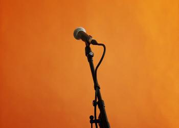 Microphone against orange background